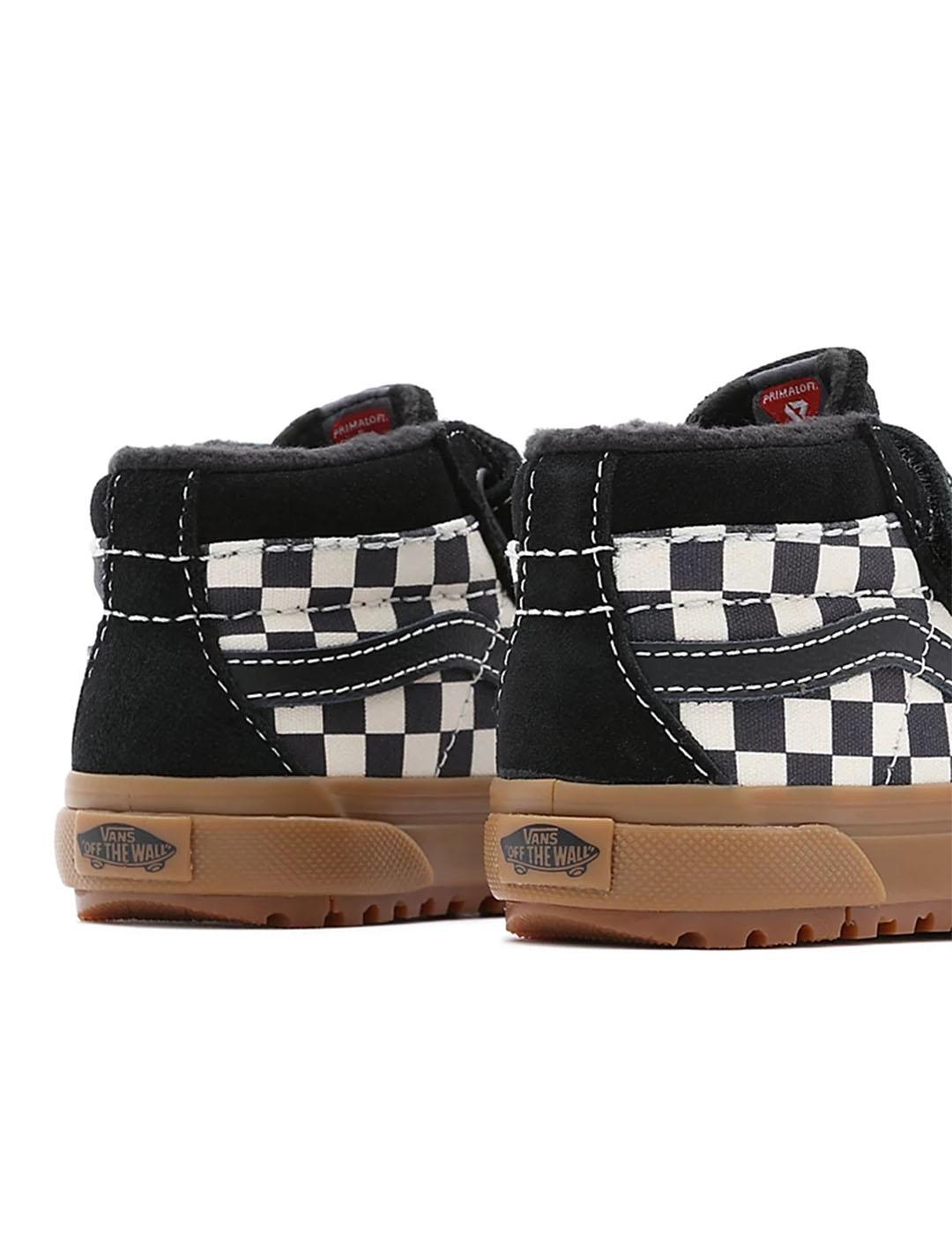 Vans negras con cuadros 2025