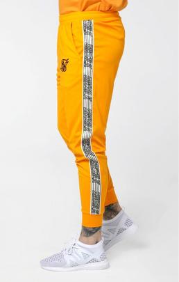 Pantalón Hombre SikSilk Runner Amarillo.